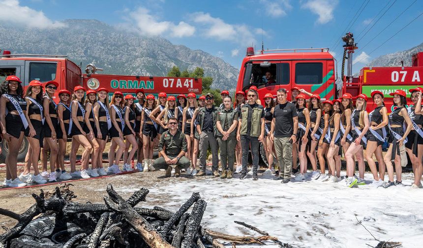 Kraliçe adaylarına yangın söndürme eğitimi
